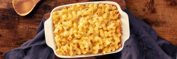 A delicious baked macaroni and cheese dish in a white casserole dish