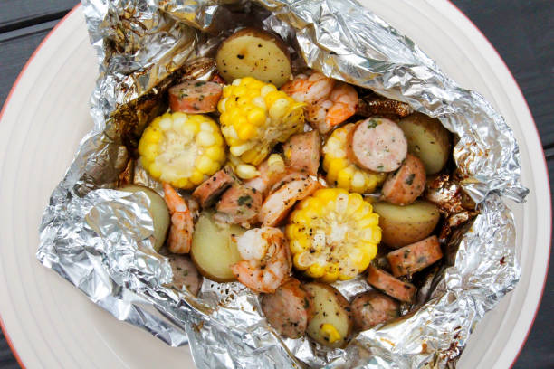 Foil packet meal with shrimp, corn, sausage, and potatoes